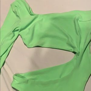 Neon green one shoulder cut out bodysuit